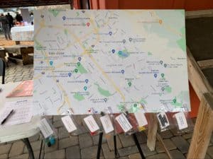 Printed map of San José displayed at outdoor event