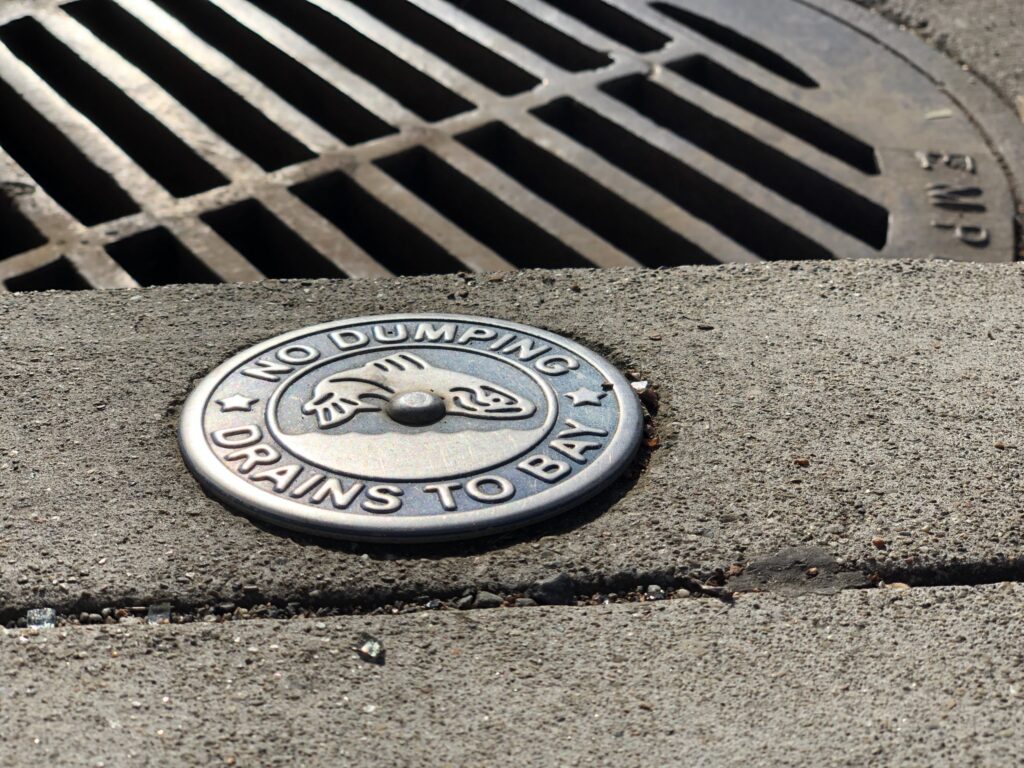 No dumping, Drains to Bay plaque